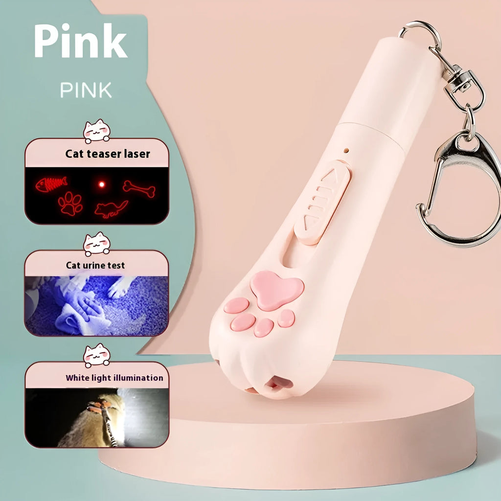 Cream white plastic cat teaser wand with laser light and attached fabric catnip pouch on a table.