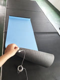 Blue conductive yoga mat with plant pattern and grounding wire, showing non-slip texture and 182cm length.