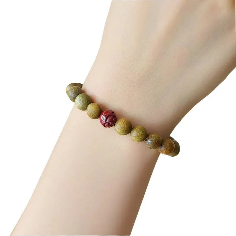 Cinnabar lotus bracelet with guajacwood beads in 8mm and 10mm sizes, retro style, picture colour