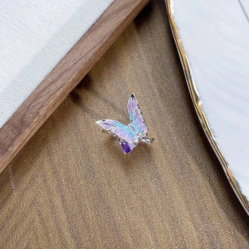 Adjustable copper insect ring with dripping oil finish in one of three colour variants.