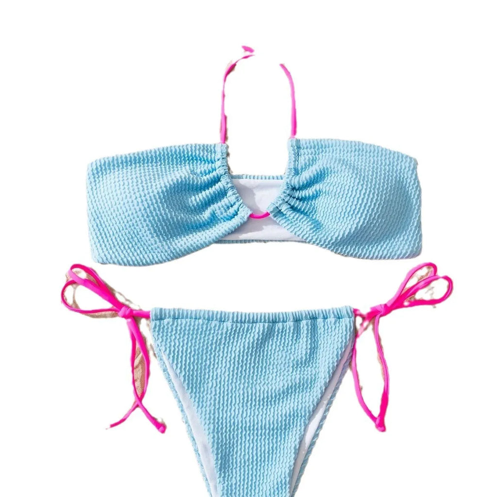 Women's solid colour halter neck lace-up separated two-piece swimsuit on a model.