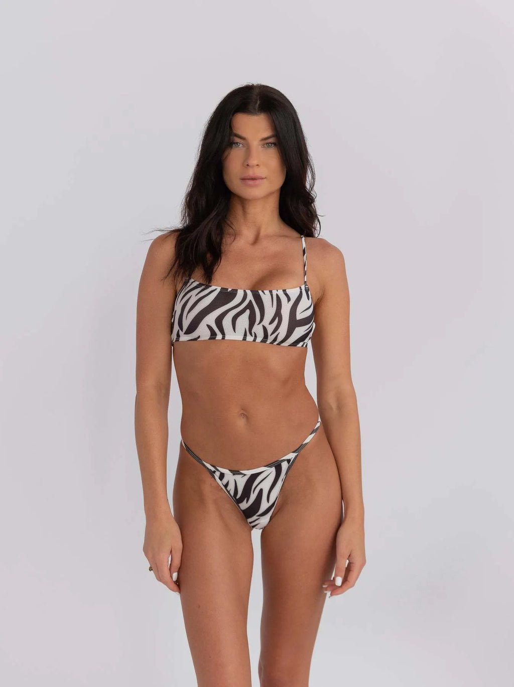 Women's striped bikini swimwear with adjustable chest wrap and triangle pants strap