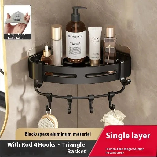 Gun Gray metal corner storage rack mounted on a bathroom wall, holding toiletries.