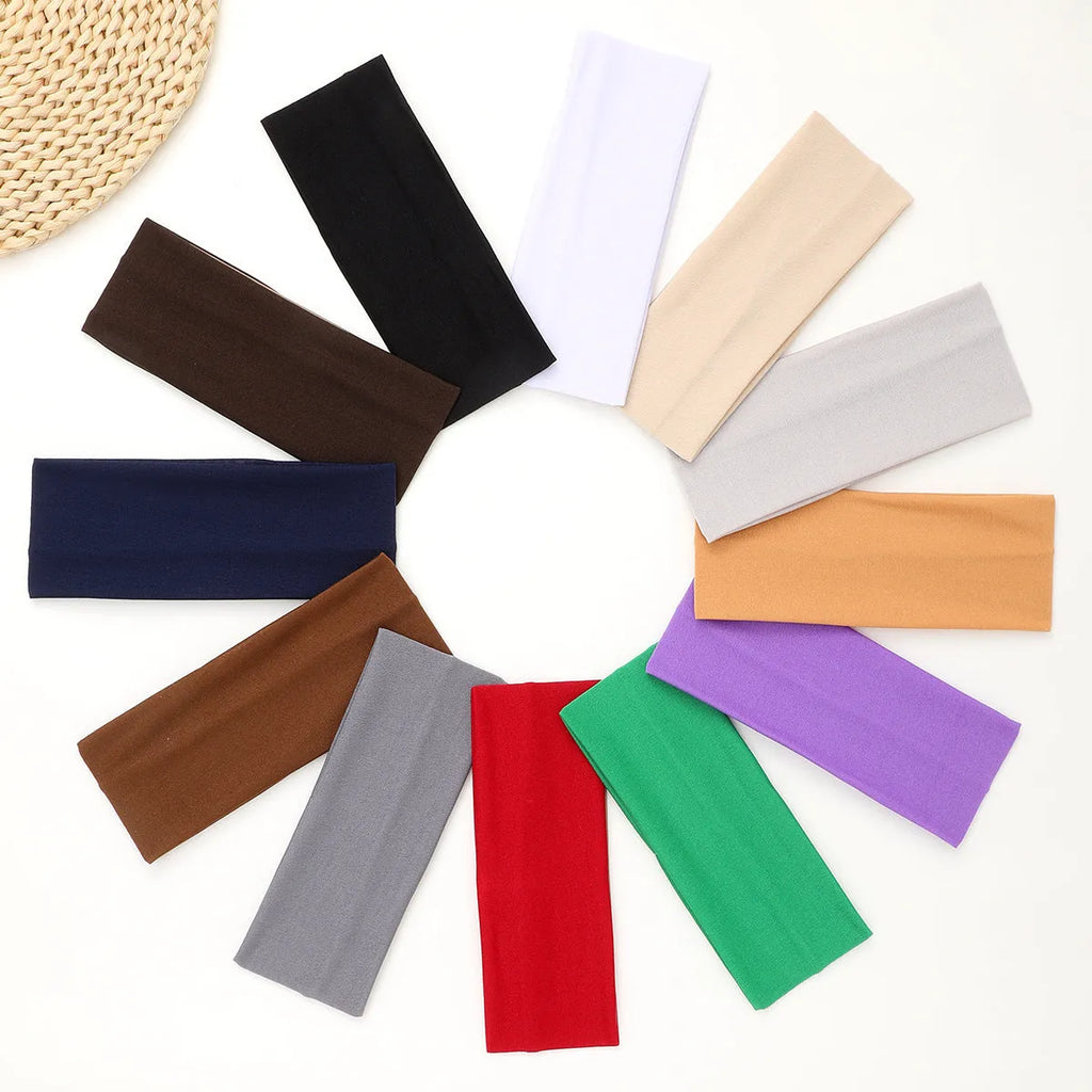 Wide solid colour sports headband with high elasticity and sweat-absorbing fabric, available in 12 colours