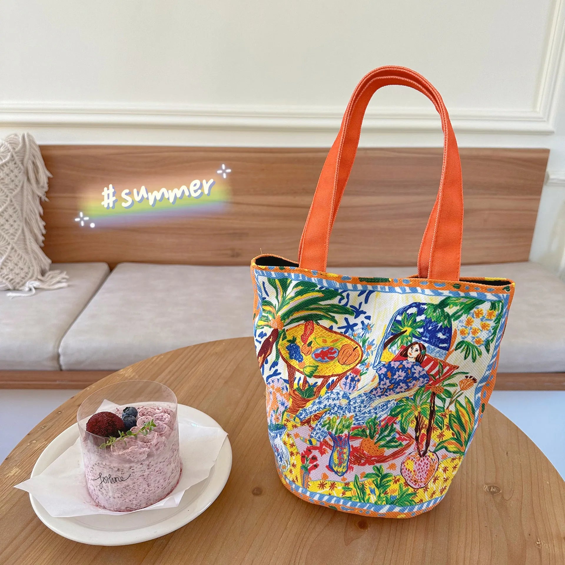 Dream Garden orange plush canvas women's bucket bag with double shoulder straps and printed letter details