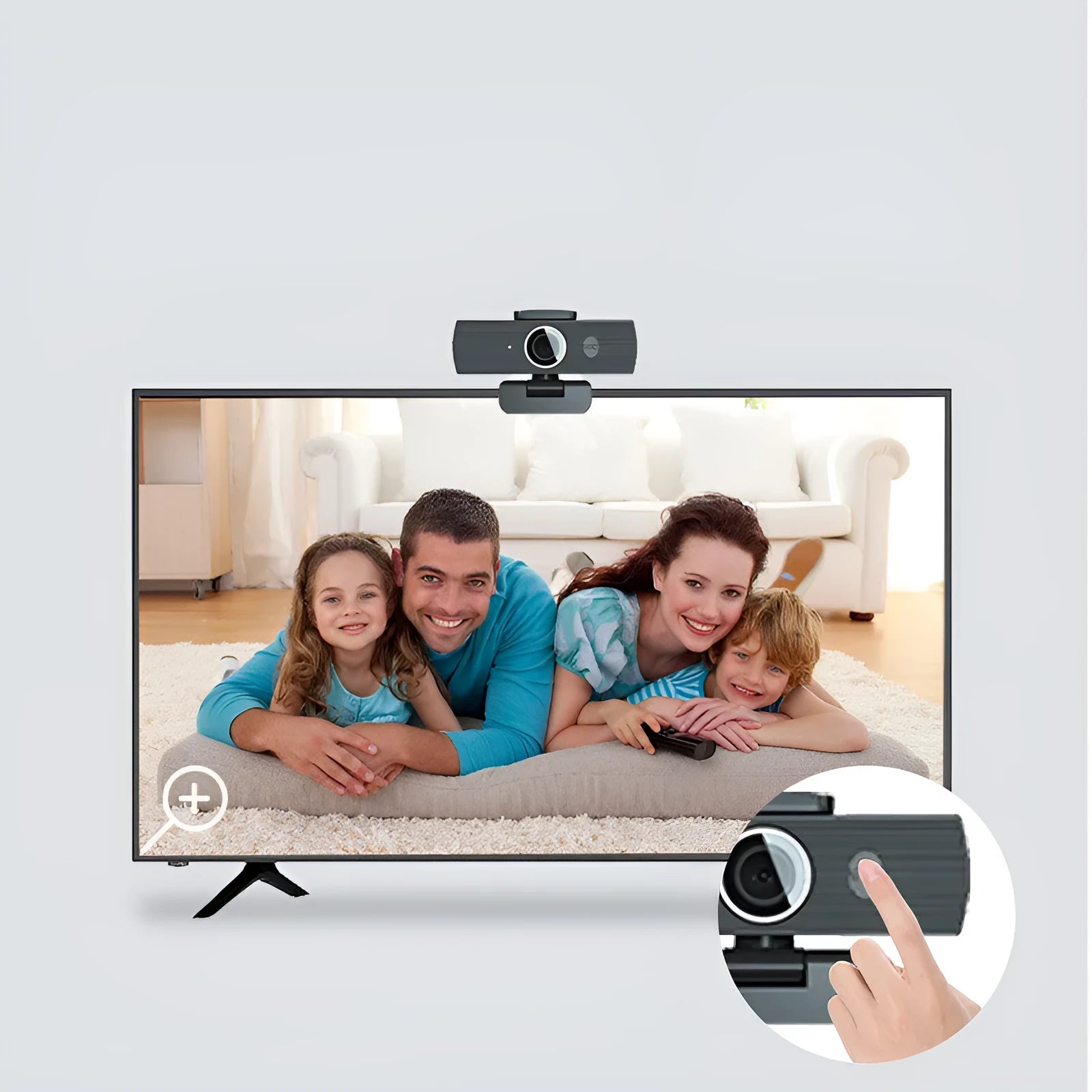 Black USB computer webcam with a magnetic privacy cover on a desk.