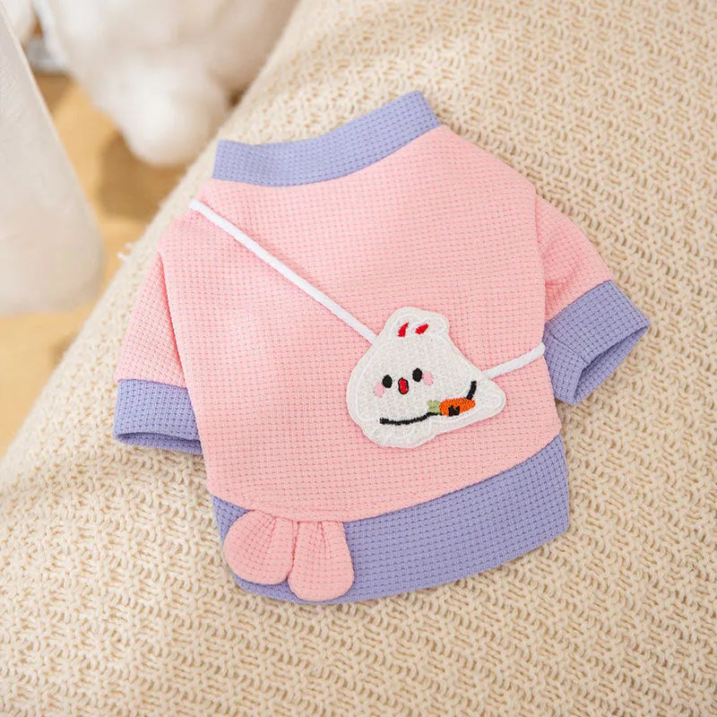 Cartoon bear print lightweight hoodie for small dogs in pink, side view on white background