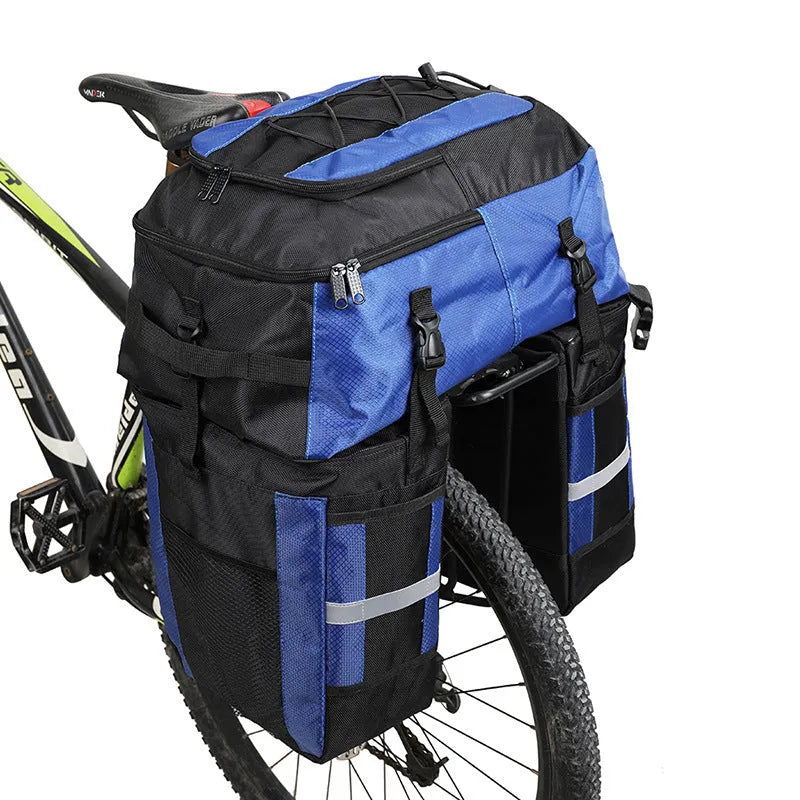 Rhinoceros large green bicycle rear pannier bag mounted on a bike rack for touring.