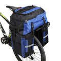 Rhinoceros large green bicycle rear pannier bag mounted on a bike rack for touring.