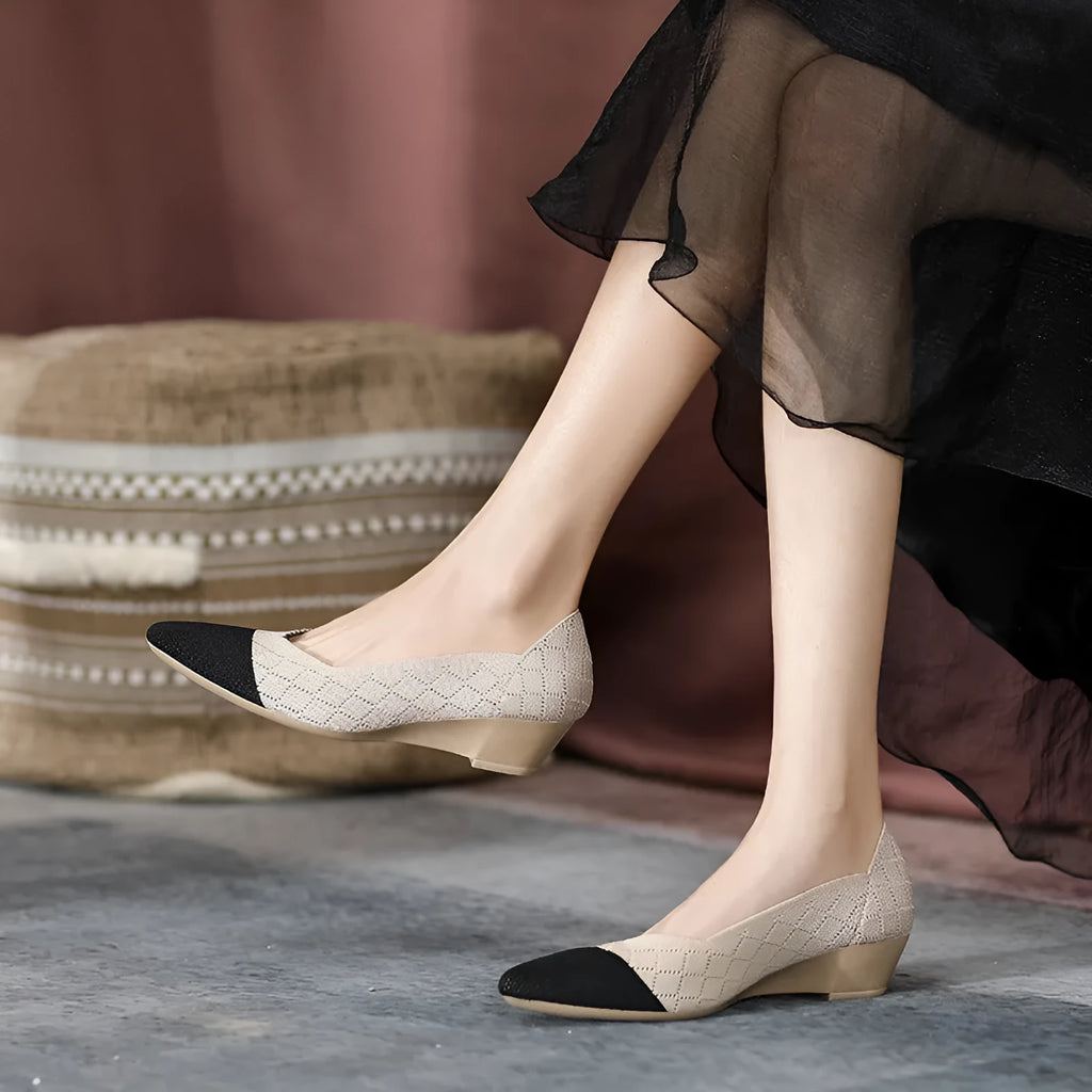 Women's wedge knitted casual shoes in apricot colour with a mid-height heel and shallow-cut opening.