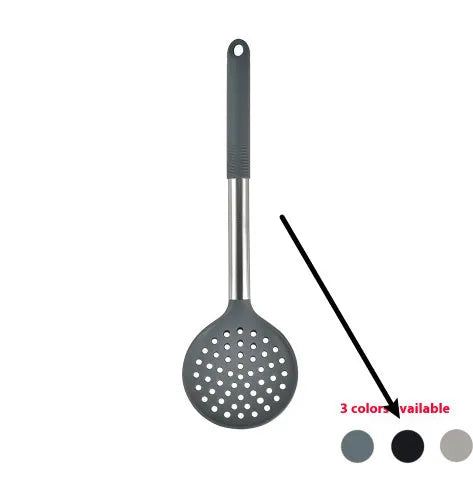 Black silicone kitchen utensil set with 12 tools in a rotating storage bucket on a kitchen countertop