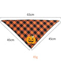 Orange Halloween dog bandana with pumpkin appliques and skeleton print on plaid fabric