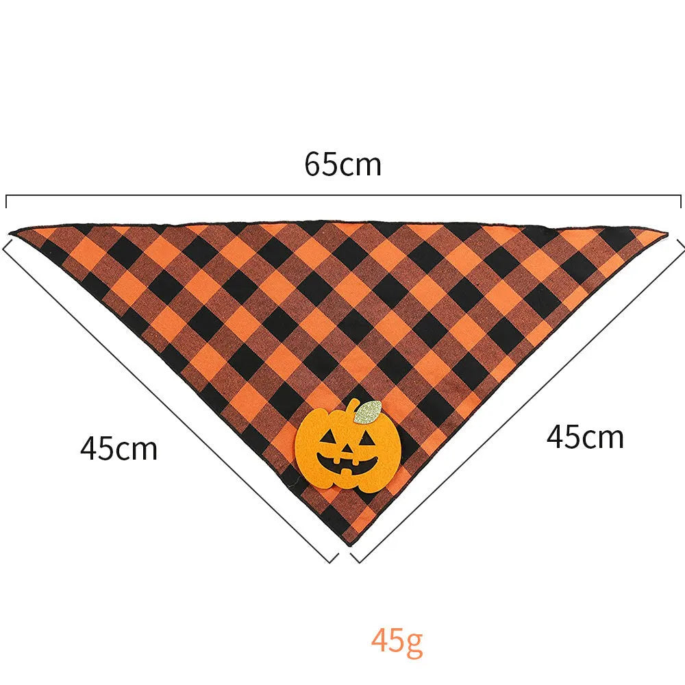 Orange Halloween dog bandana with pumpkin appliques and skeleton print on plaid fabric