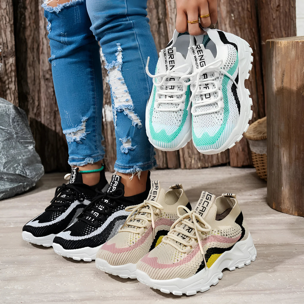 Women's casual sports shoes in mesh with lace-up front, shown in multiple colour options.