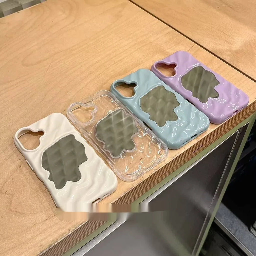 Solid colour iPhone case with water ripple texture and a small mirror, shown in beige colour.