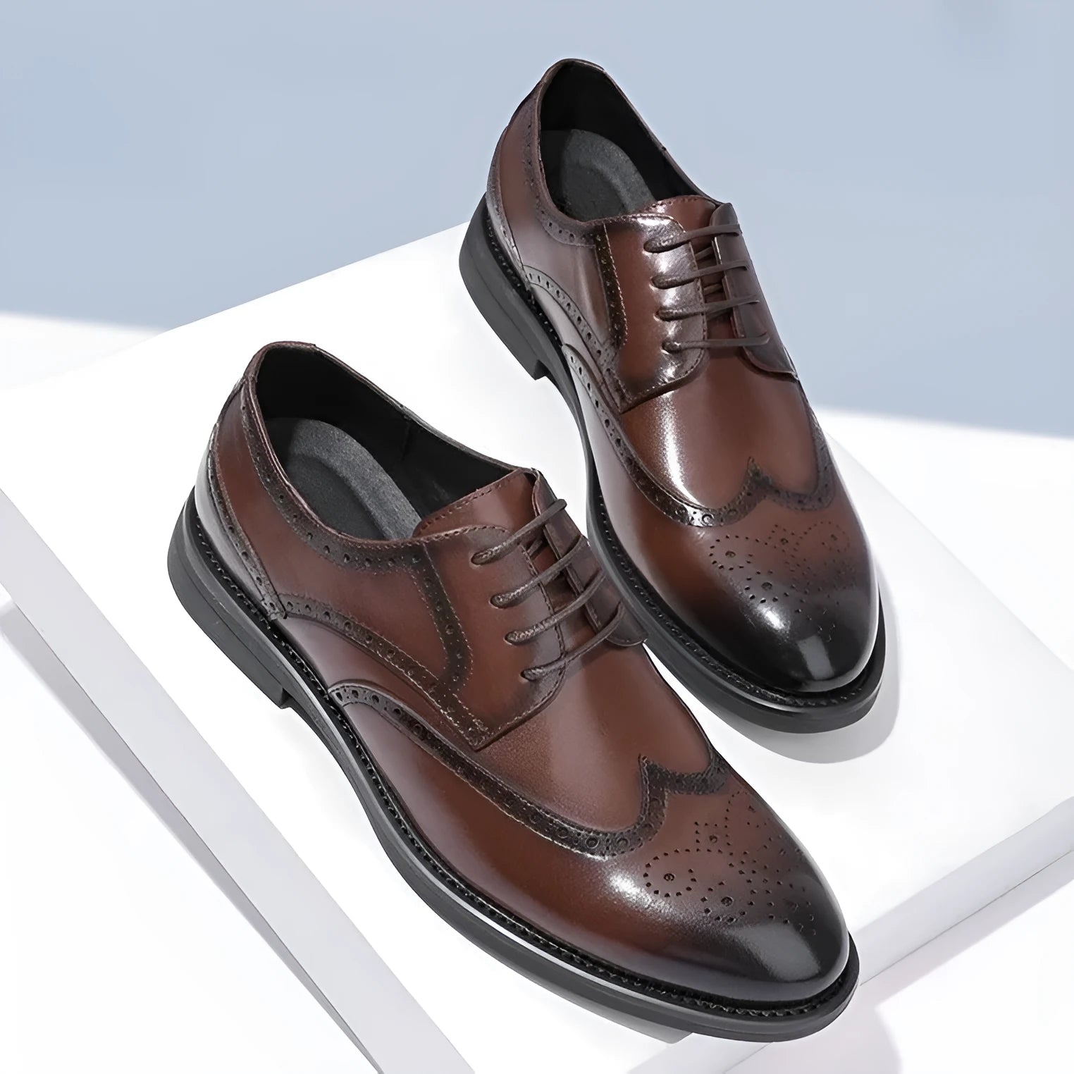Men's black and brown brogue style shoes with a PU leather upper for business wear.