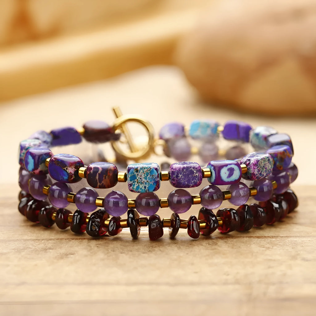 Purple amethyst and garnet stone bead bracelet with geometric design and manual craft details