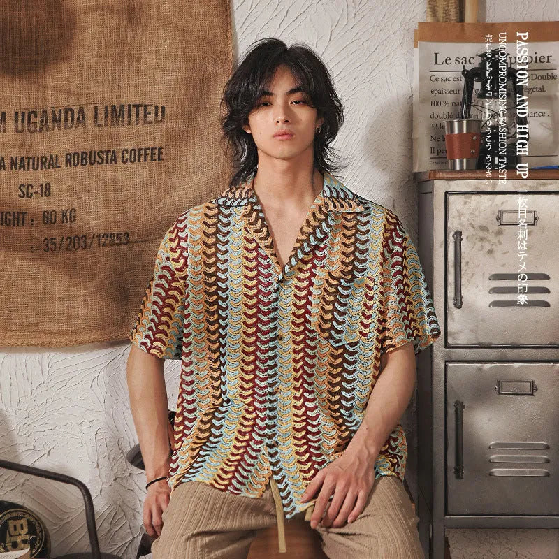 Grey short sleeve Cuban collar shirt with jacquard pattern, shown on a model.