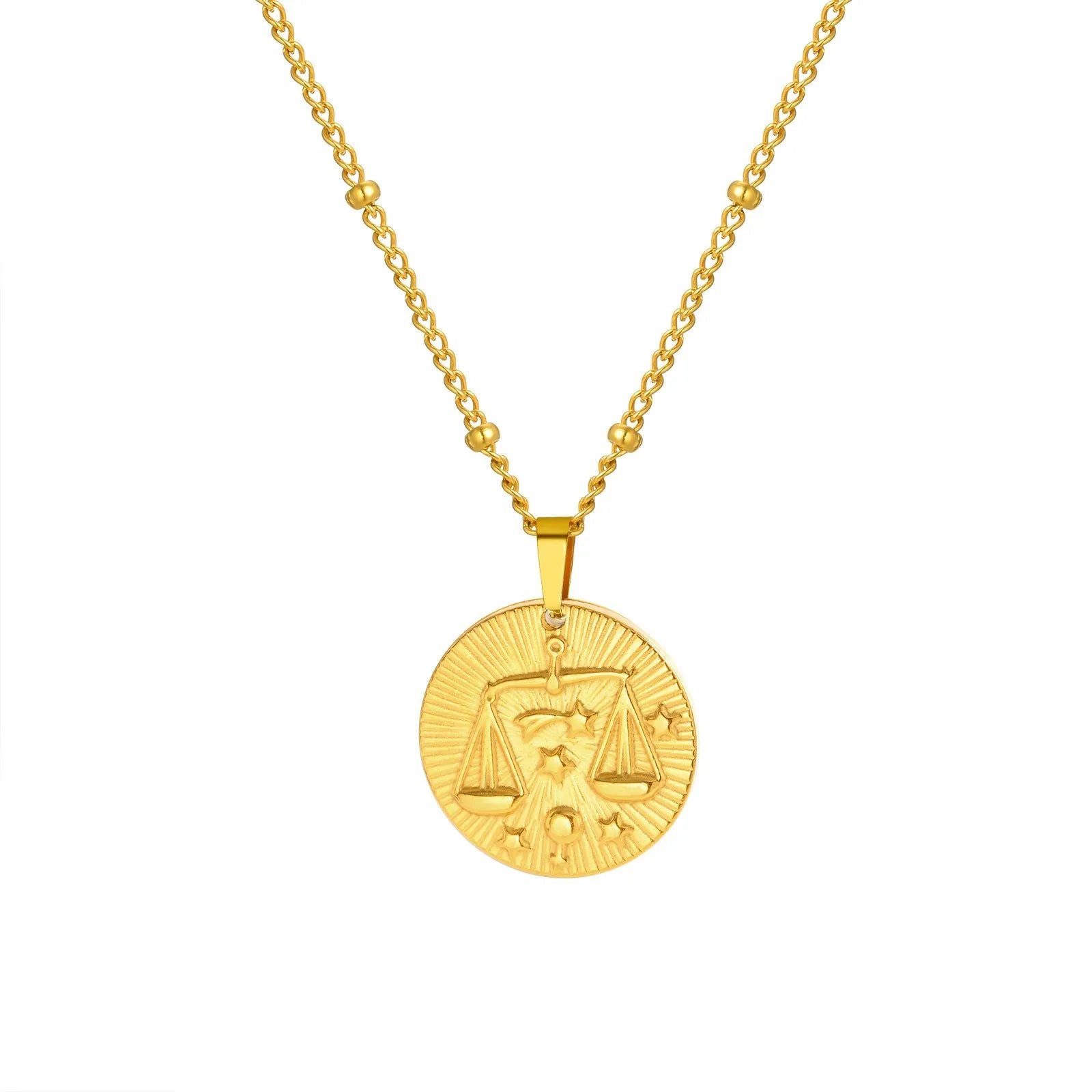 Stainless steel cross chain necklace with a geometric round bead pendant embossed with a zodiac constellation design.