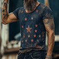 Man wearing a grey loose-fit t-shirt with a colourful, detailed 3D art retro pattern on the front.