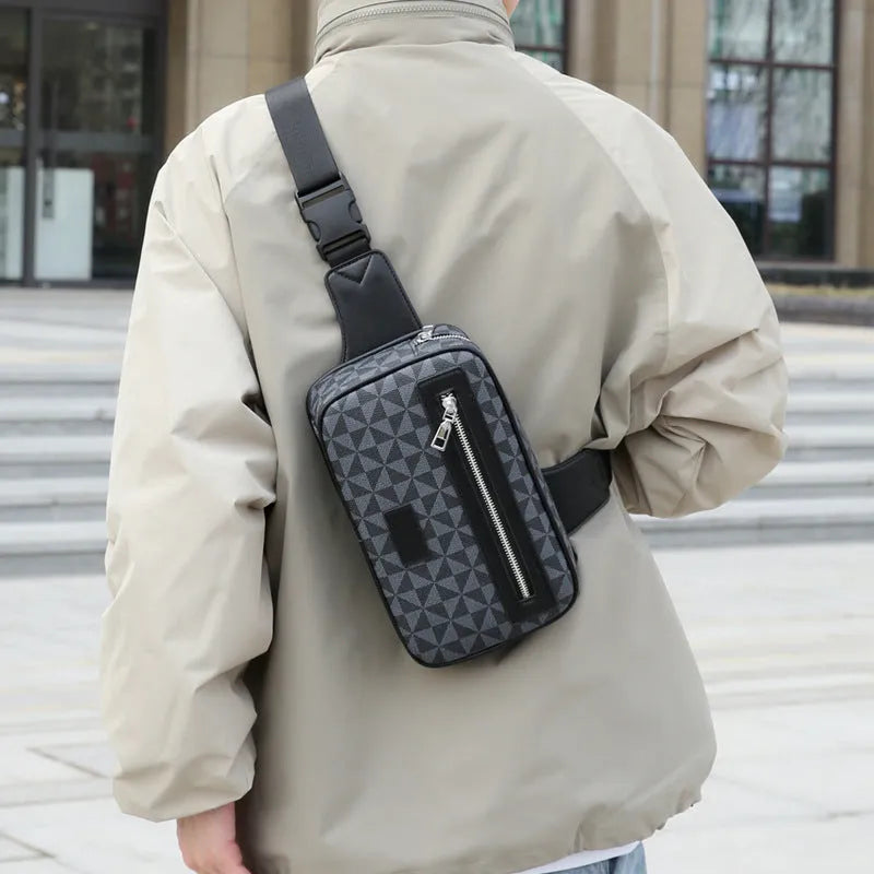 Men's black PU crossbody shoulder bag with chest-printed design and visible sewing lines