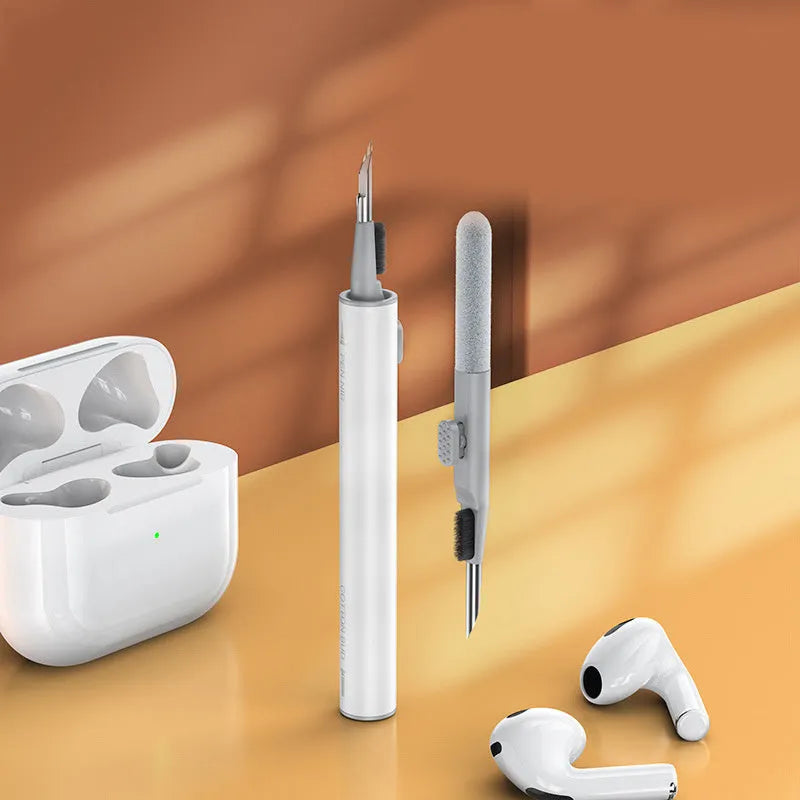 3 in 1 headset cleaning pen with metal tip and sponge on white background