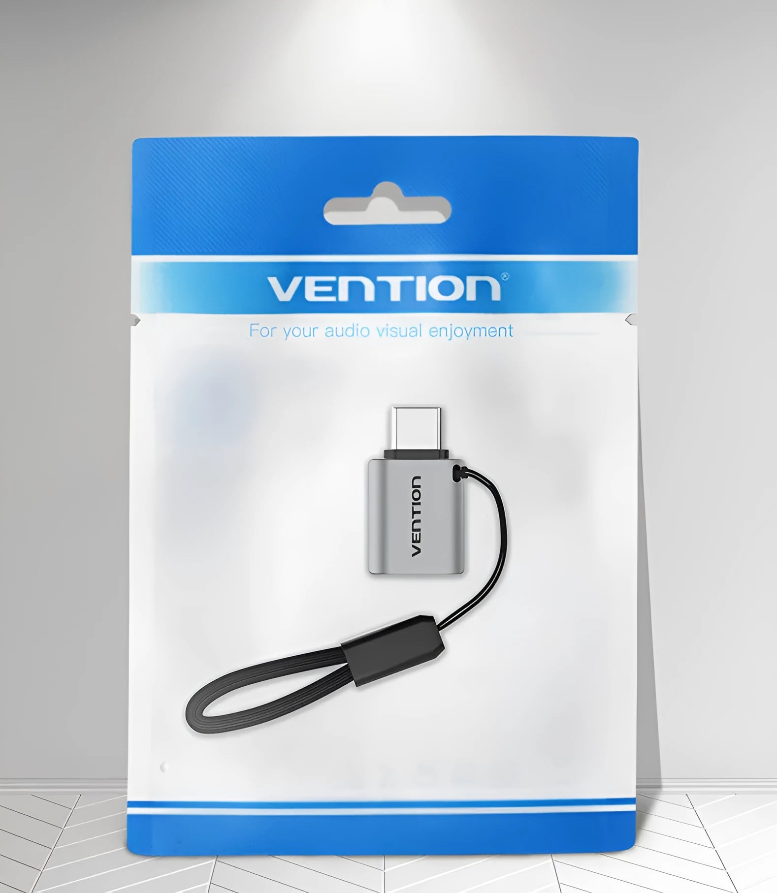 Grey aluminium USB 3.0 Type-C male to Type-A female OTG adapter with attached lanyard