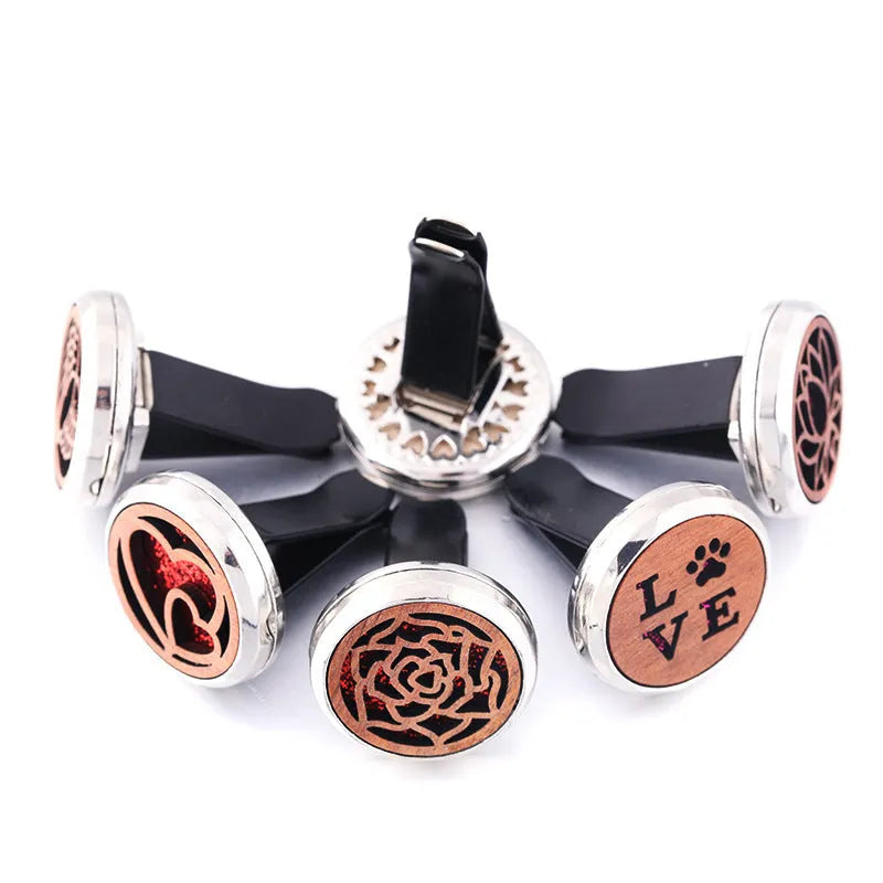 Round car hollow wood aromatherapy clip in alloy wood construction showing vent attachment
