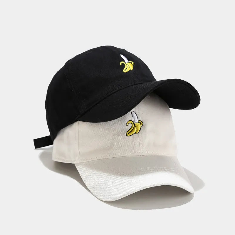 Cute banana fruit embroidered soft top baseball cap on adjustable strap, shown in peacock blue colour.