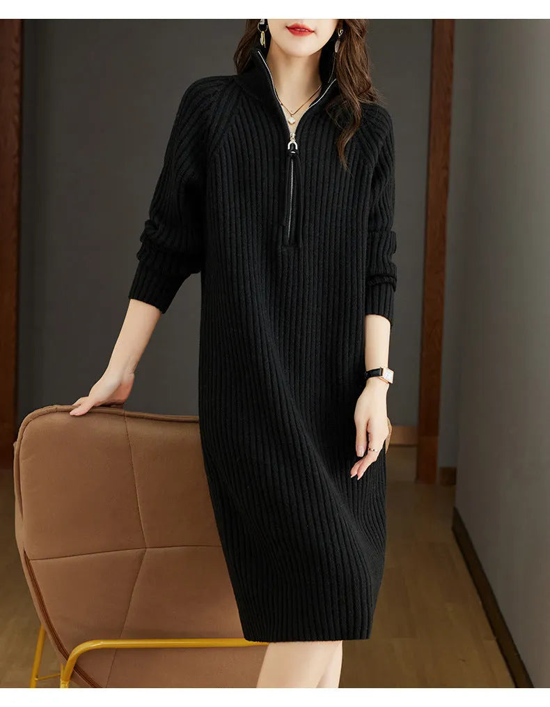 Beige half-zip woollen midi dress with long sleeves and a stand collar, laid flat.