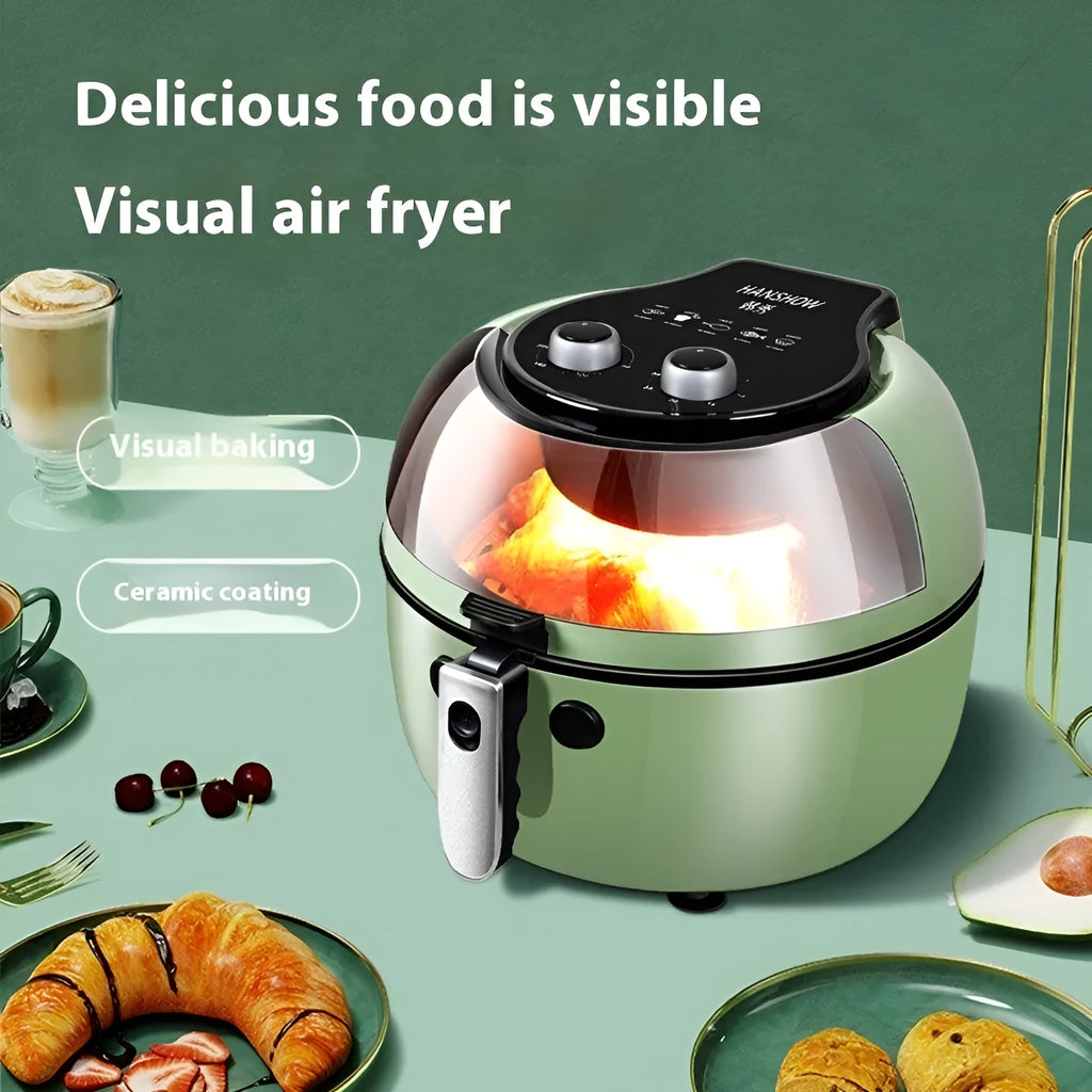 Silver mechanical button air fryer with transparent lid showing 8-litre nano-ceramic cooking basket inside.