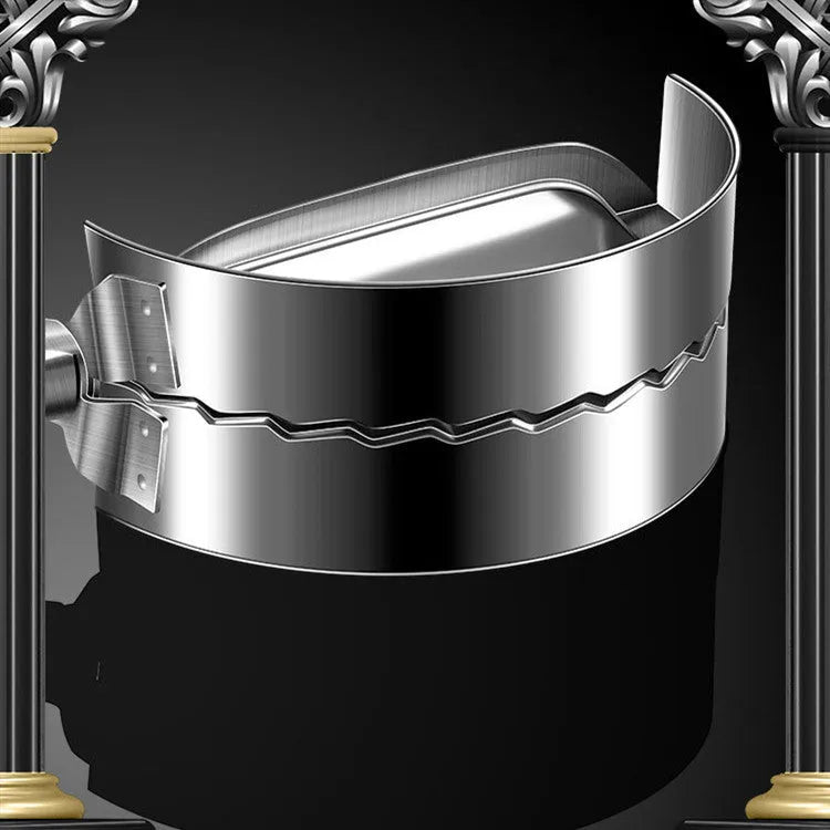Silver-colour stainless steel manual dumpling mould on a kitchen counter.