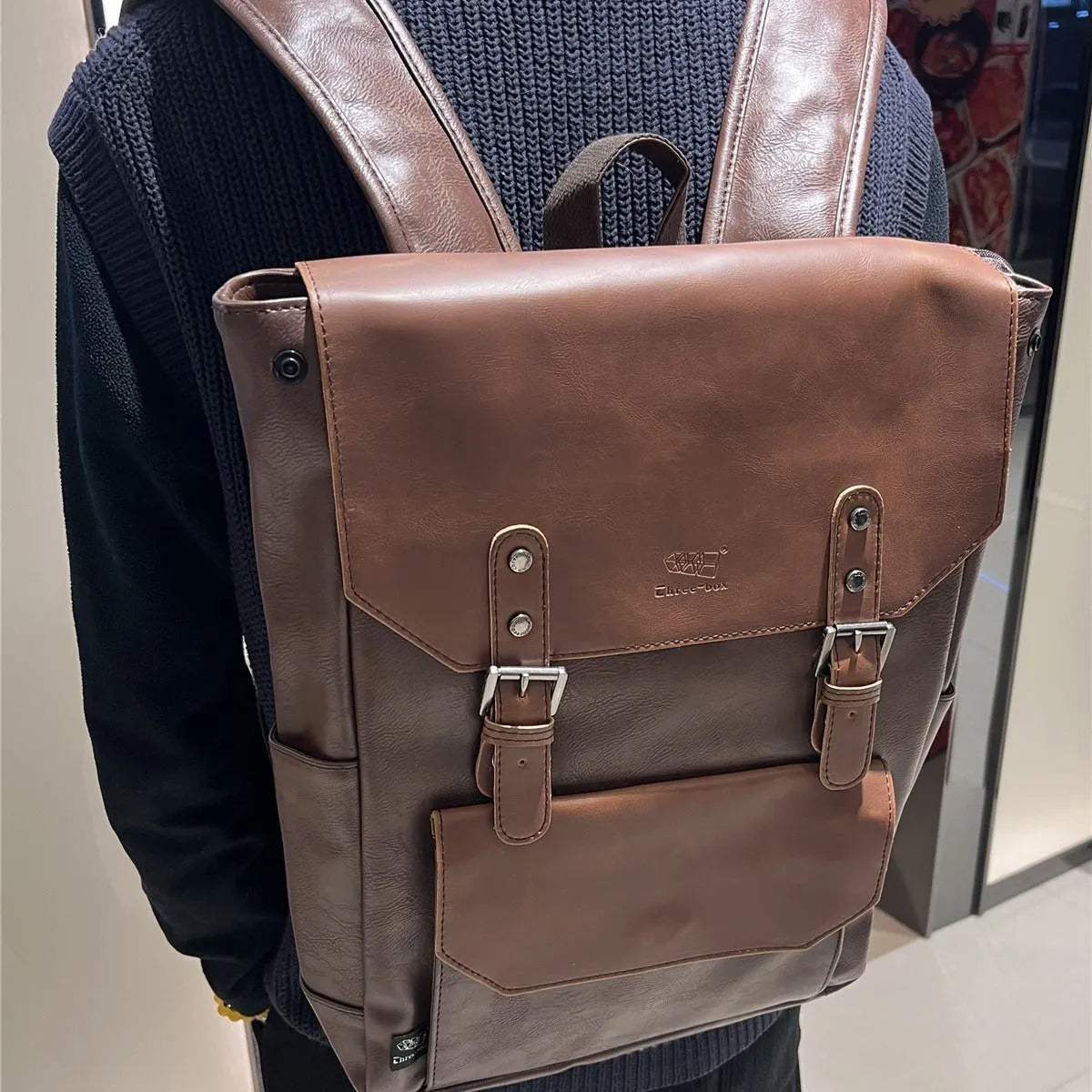 Unisex breathable PU backpack in light brown colour showing college style design