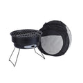 Small round folding metal ice stove with barbecue grill and mesh, set up on its legs for outdoor cooking.