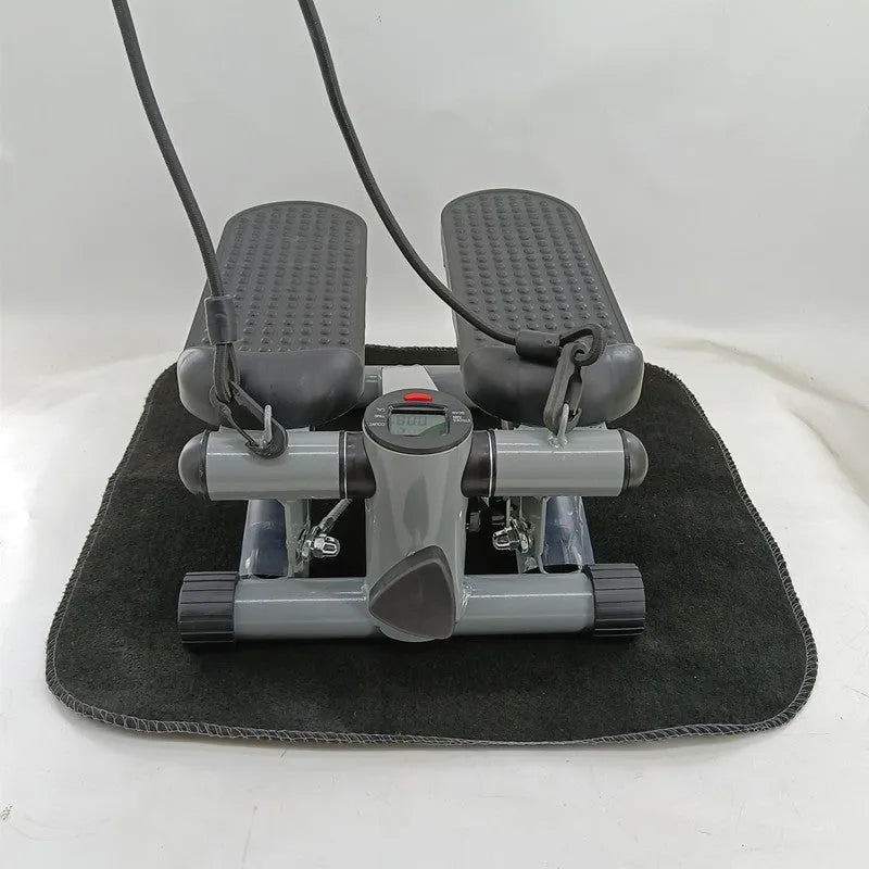 Silver grey hydraulic resistance exercise stepper machine for home fitness.