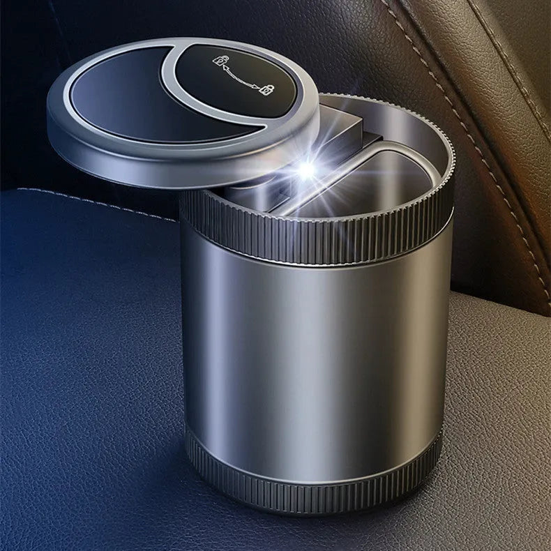 Automatic induction ashtray in black with USB cable, suitable for car, home, or office.