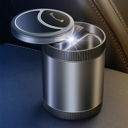 Automatic induction ashtray in black with USB cable, suitable for car, home, or office.