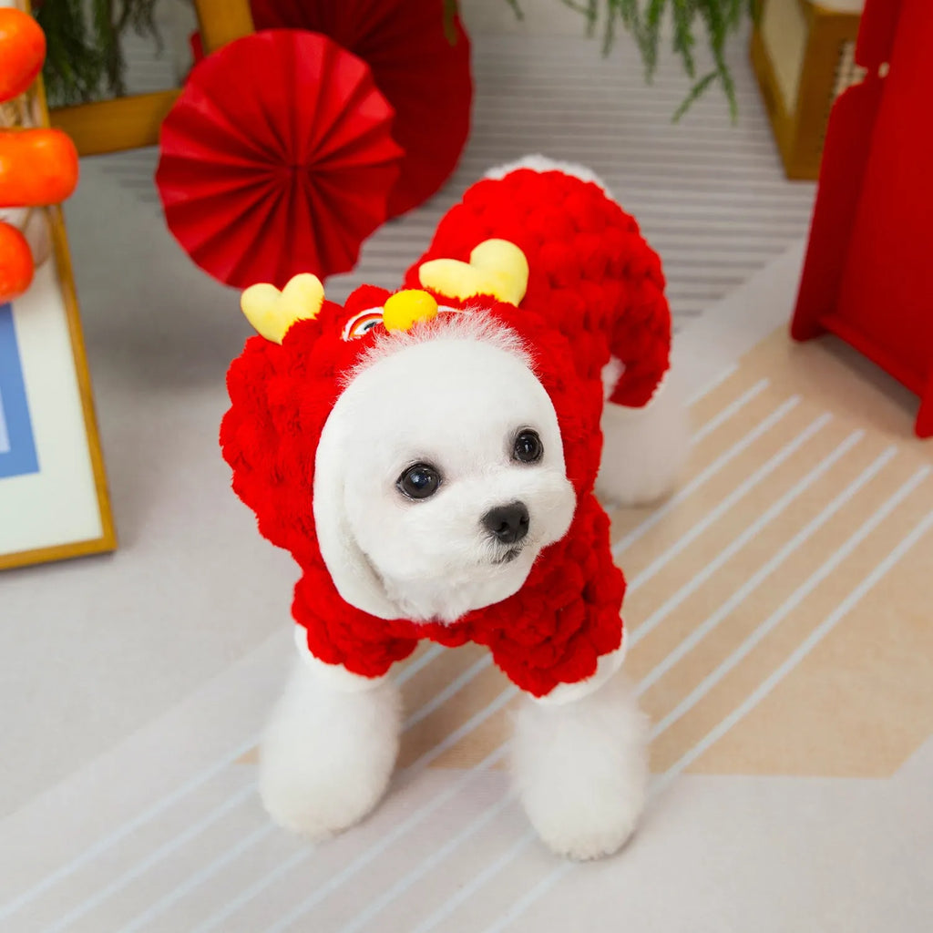 Red velvet dog jacket with cartoon dragon design for festive pet wear