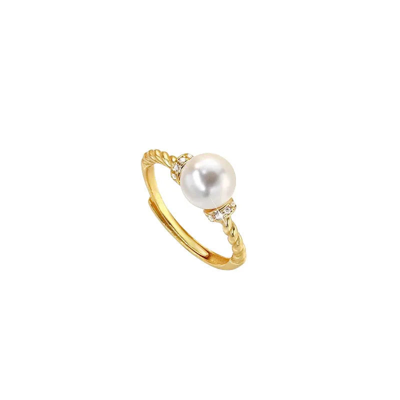 Antique twist pearl ring in copper with adjustable size and geometric design, available in gold or silver colour.