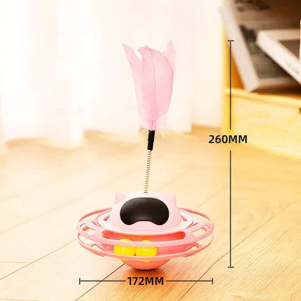 Pink cat tumbler turntable toy with stick attachment measuring 17cm by 10cm