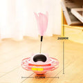 Pink cat tumbler turntable toy with stick attachment measuring 17cm by 10cm