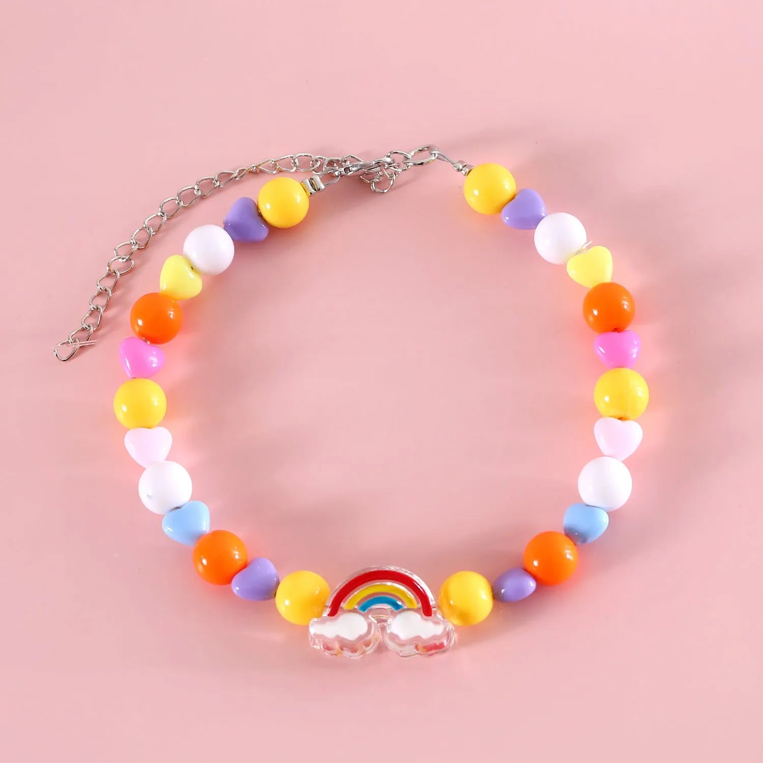 Colourful plastic bead pet necklace shown in peach, rainbow, and small flower patterns with an adjustable clasp.