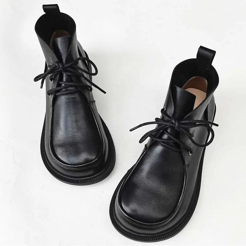 Big Toe women's pure leather ankle boots in black, low tube, rubber sole, hollow out details