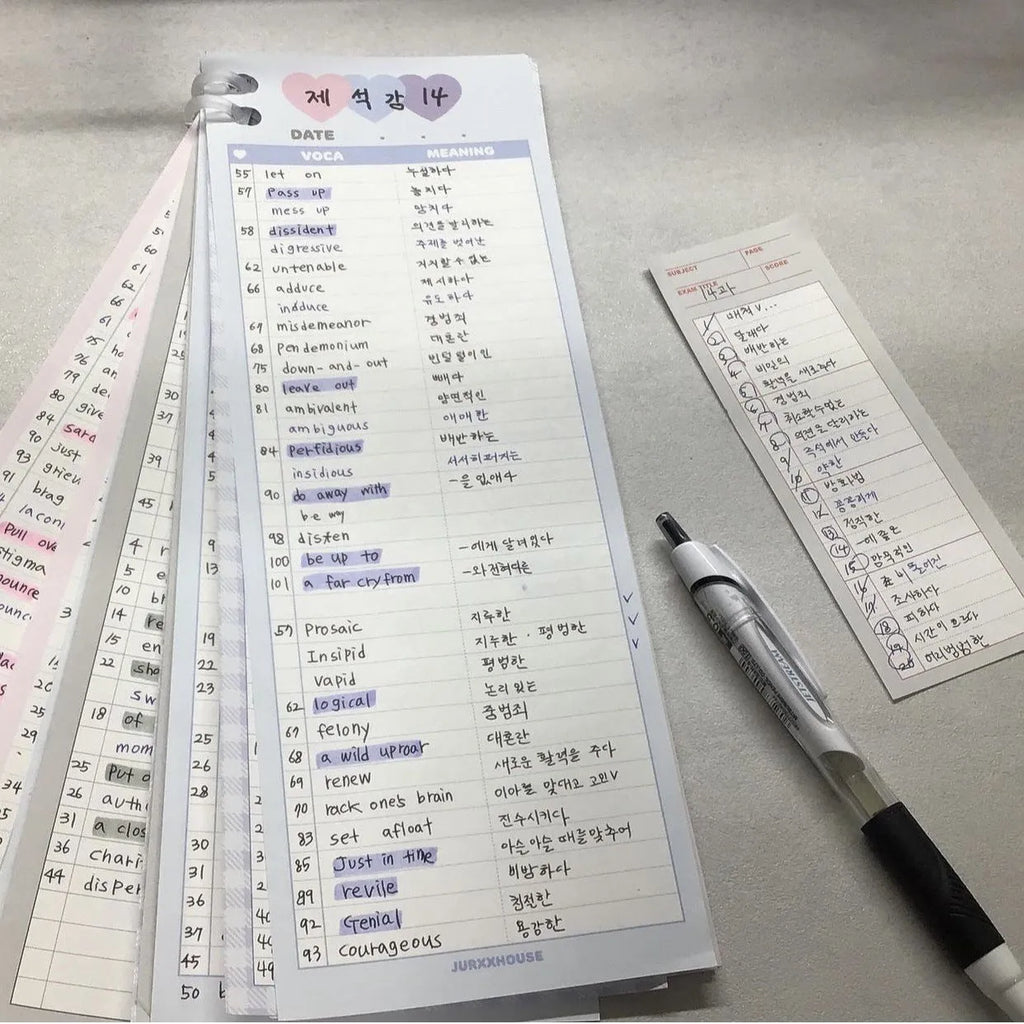 Vertical B5 half-size notepad with English words printed on paper, shown in pink, purple, and blue cover colours.