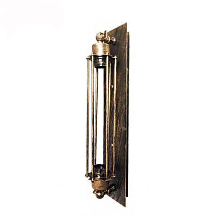 Industrial retro flute shaped iron wall lamp in an antique finish, shown mounted on a wall.