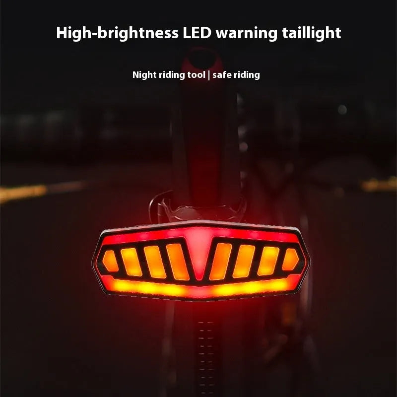 Wireless remote control bicycle taillight with charging cable on black background