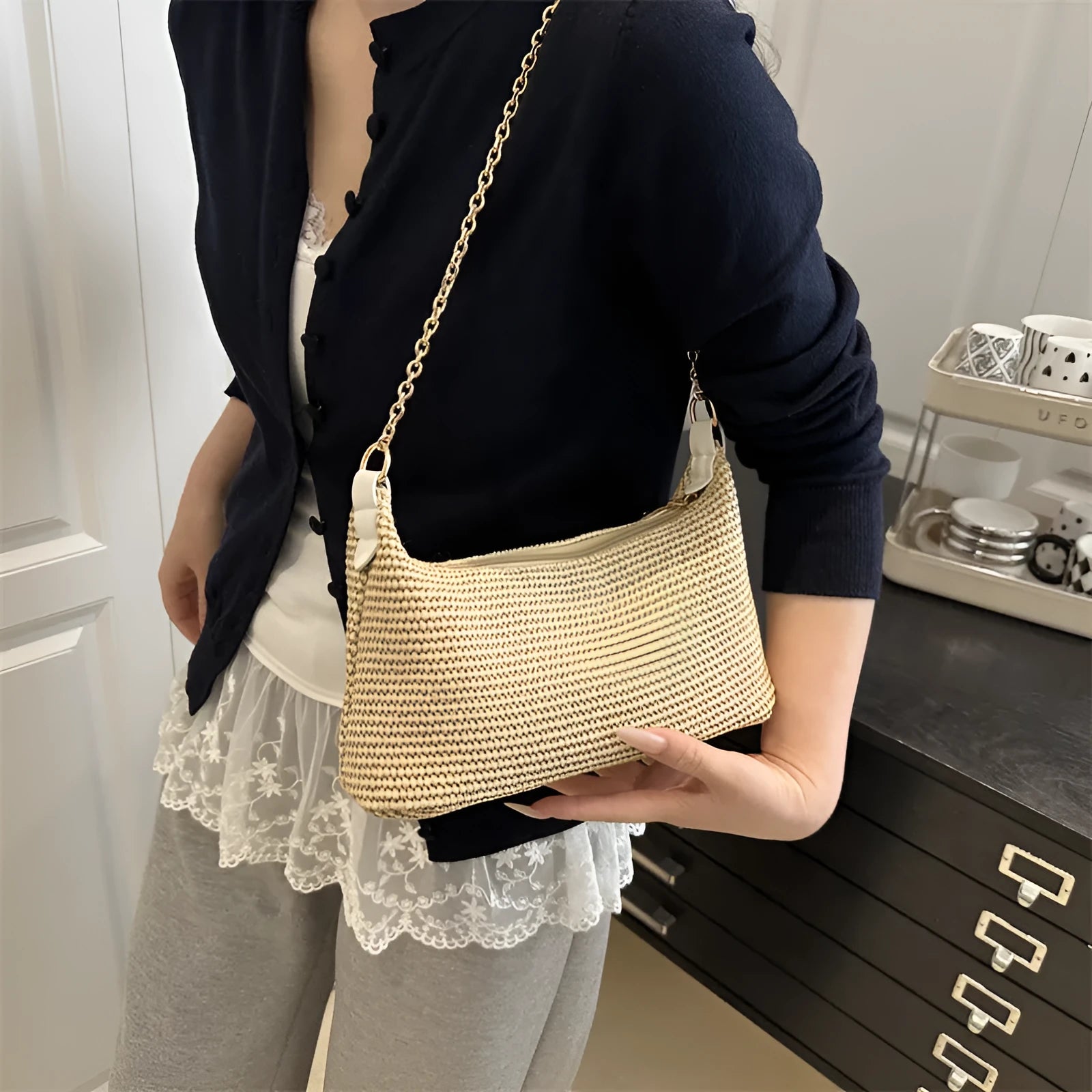 Woven straw crossbody handbag with horizontal square shape and phone compartment