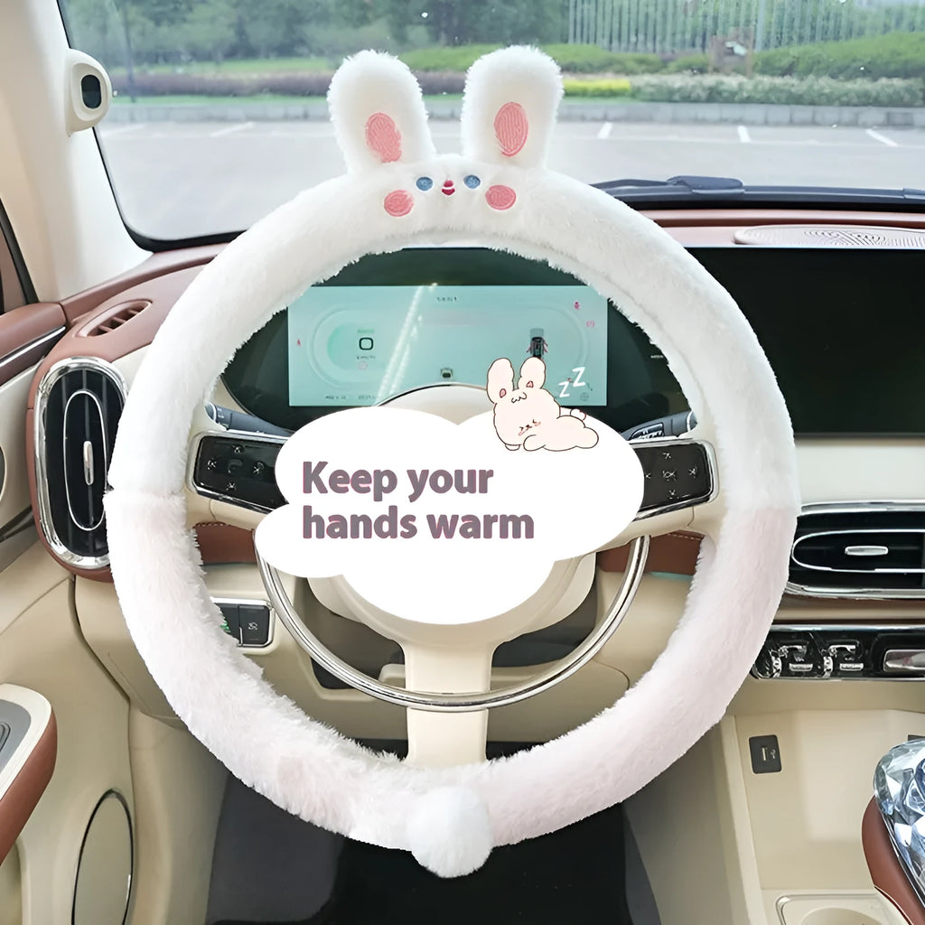 Plush cartoon animal steering wheel cover with embroidery, shown fitted on a car wheel.
