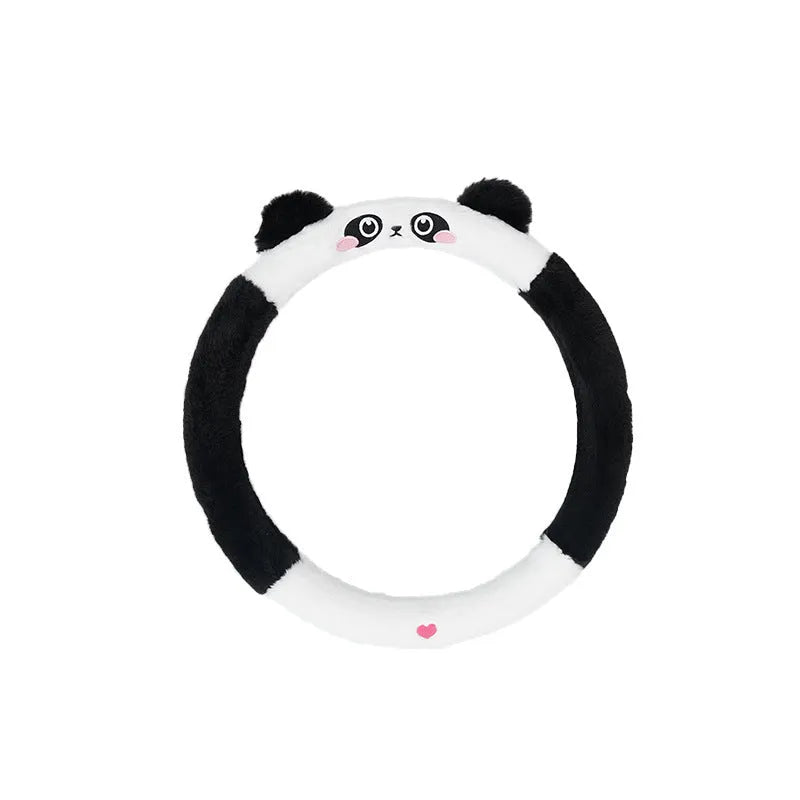Plush cartoon animal steering wheel cover with embroidery, shown fitted on a car wheel.
