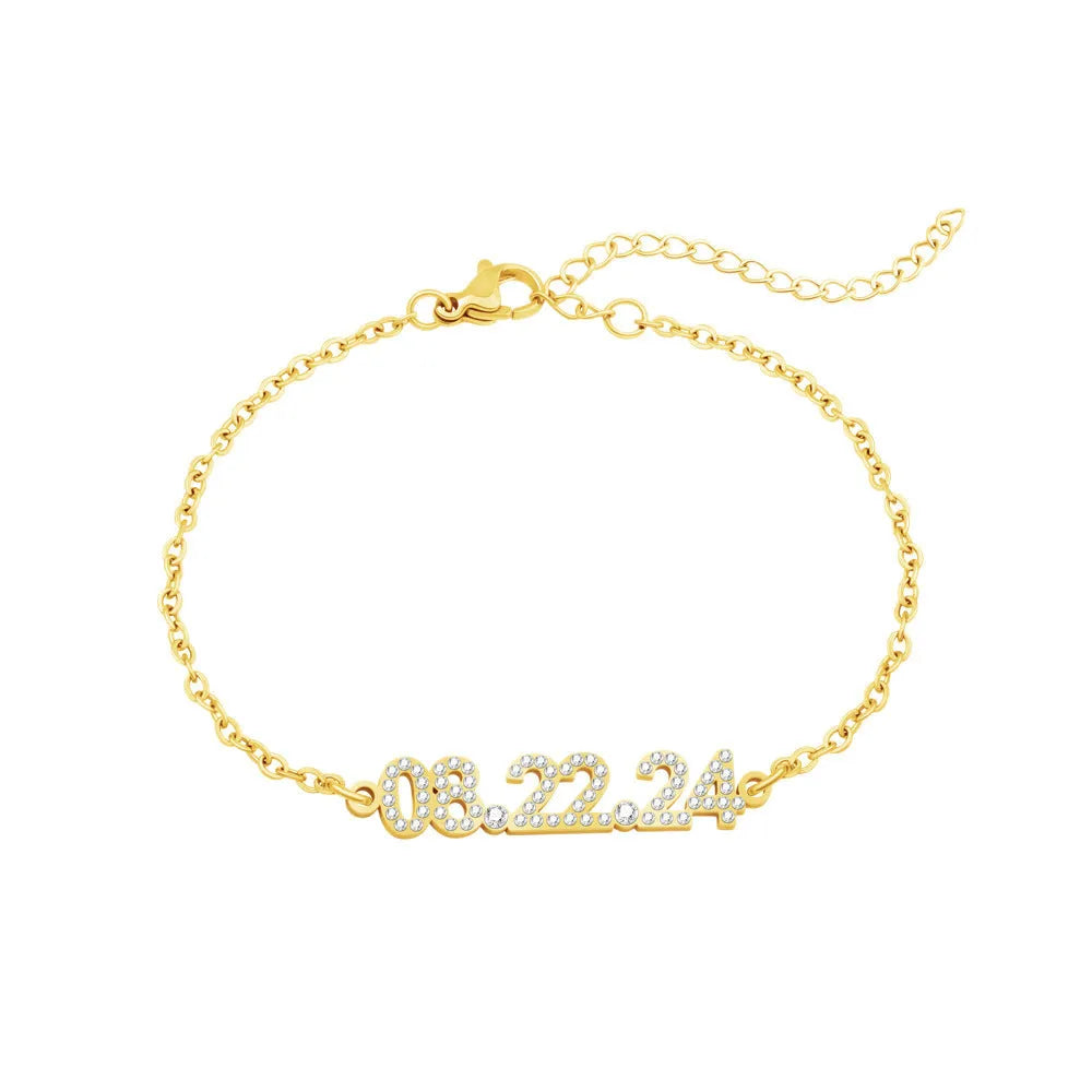 Stainless steel digital bracelet with diamond set numbers on display, shown in a gold colour option.